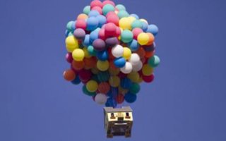 GOING UP! HOUSE LIFTED 10,000FT IN THE AIR BY 300 CLUSTER BALLOONS  | Hearts pounding, two world-class balloonists stand inside a small house looking up; not at a ceiling, as we might expect, but instead a large hole through which they can see 300 brightly colored weather balloons tethered inside.