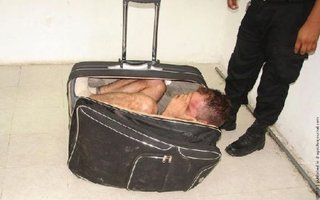 A Mexican Gangster Tried to Escape in a Bag  | Here&#039;s some photos of this Mexican gangster who tried to escape in a bag.